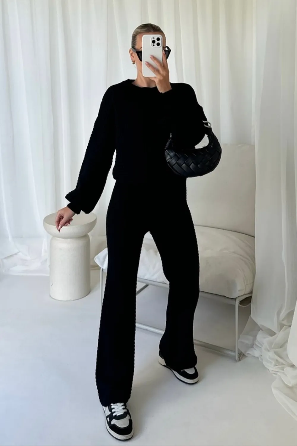 Ashley black knit sweater and trousers