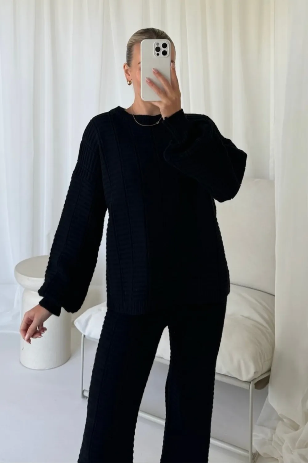 Ashley black knit sweater and trousers